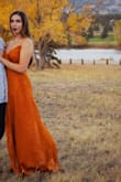 Fit was great, a little long but I wore shorter heals with it. Color is beautiful especially in the sun. Material is comfortable. - Kali G.
