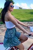 Great top for summer with a high waisted skirt. I have to wear a strapless bra with it. - Missy C.