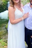 As with most brides, COVID threw a few wrenches in wedding plans. My husband and I decided to elope the two of us and I needed dress options stat! I told the people at multiple dress shops I would only buy a dress I didn't have to alter and fit like a glove. I was told good luck... that didn't exist! I ordered this in a L and XL the day after I ordered 4 other dresses and paid again for 2 day shipping (I had a week till we left!) and almost didn't buy this one to save the rush shipping $. THANK GOODNESS I DID! The pictures do not do this dress enough justice, it is really lovely and for better (and I felt better) than the $2,000 dresses I considered. No one believed it was from Lulus. I didn't need undergarments and nothing about it felt cheap or rushed, it truly felt like the wedding dress I was meant to have all along! - Mary E.