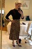 I'm 5'4 and this comes to lower mid-shin, looks too old lady without the heels. I ordered both the small and medium and there is a huge size difference! Will have to keep the small or the medium would slip off. The pattern is chic! - Danielle B.