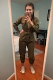 I absolutely love this and I'm so glad I bought it! I've been looking for a boiler suit/flight suit that was figure-flattering rather than baggy and this is perfect. I was worried about ordering a Small because I have wide hips and the size chart suggests a Medium, but the Small fit perfectly! It's worth noting that there's no stretch in the fabric so you need it to be a little loose in the hips to be able to sit down. The fabric is pretty thick, it's definitely good quality. The ruching at the calves is really cute as well and makes it look less utilitarian. Overall I love it, would definitely recommend! - Karen L.
