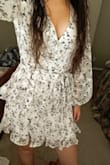 This dress was lightweight and very cute, but not my style. Dress was true to size. Lulus was great in accepting the return. - Tiffany U.