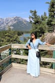 I am 34C chest size with 27" (high) waist and this felt big on the body. And because it fit big around the chest, the neckline dipped lower than I had anticipated. However, it looked lovely when paired with the blue long skirt from Lulus! Good purchase overall. - Sujaya S.