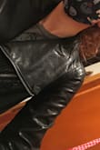 I went with my regular size (small), and it turned out great. My arms are long and thin, so I thought M would be too big. I was right. I won't wear this with sweaters, though, so consider that when buying. The jacket comes to life when you put it on - awesome design! - Merlin U.