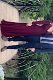 Loved this dress. Wore to my brother's outdoor fall wedding. The wrap style was very flattering. Could make this dress work for any body shape. 
This dress is long, worked well for my height but under 5'8" you might be getting this altered. 
I did not have the sleeves buttoned completely. They were very tight on the wrists. I kept the cuffs unbuttoned and tucked up without issue. - Diana H.