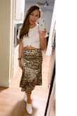 Super cute and soft long crop tee. The material is so soft and stretchy and it isn't see-through. The color is more of an off white cream color and not a pure white, but I love this color specifically for fall. Overall a great basic crop top has. - Judy V.