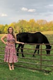 I wore this to an October wedding and it was perfect! It has fall colors but loved the purple, plus no one was wearing anything like it. It was flattering, and flowy, and romantic and I felt so pretty in it. I would say the top did fit a little loose, I could see the sides popping over the belt in pictures. Also, I'm tall, so the natural waist wasn't quite hitting me as my waist (common problem) so I may have this tailored for future events. But it's nothing anyone else would notice, and if you add your own belt, it cinches you in perfectly! Highly recommend! - Rachel S.