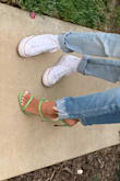 I am obsessed with the design of these heels, and I LOVE how many colors Lulus offers. The straps are so modern and simple. I received a lot of compliments on these when I wore/posted them. I don't know why it won't let me rotate this photo but here was a picture of them on. My only qualm is that my feet are really thin so the straps don't hold my feet in super well when I walk, but it's not a big problem - just preference. - Shariah L.