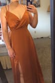 Ordered a small and xs. Went with the small Which is my usual size. Stunning color! Only gave 4 stars since the breast area is somewhat baggy. Really excited to add this color to my wardrobe. - Kendra T.
