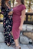 The dress was so much fun and got lots of compliments. My one complaint was that the skirt material underneath kept riding up and had to be pulled down, otherwise loved it! - Kameron S.