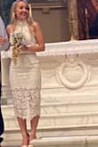I wore this dress for my wedding rehearsal! This dress forever has a place in my heart. The high neck, open back, and details made me feel like a Queen. - Kara C.