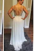 This dress was EVERYTHING and more! It fit like a glove and only required alterations of the length. A couple of the beaded strands were loose, but the seamstress was easily able to secure them. Totally worth every penny spent! Everyone was shocked to find out how little I spent on it. - Kimberly S.