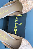 The shoes is as gorgeous in person as online! The drawback, however, is that because the toe box is so narrow you lose about a size so I can't wear the shoes. I'd suggest sizing up a full size. - Aquia B.