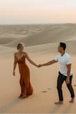 I don't normally wear this color, but my photographer recommended it and I have no regrets. The dress is such a great material and I'm so glad I picked it for our professional photos. - Amber W.