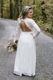 LOVED this dress! It fit perfectly except length but I'm short so that was expected. I had it hemmed and it was perfect. Everyone loved this dress, more than I expected. - Andrea W.