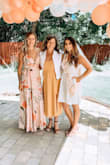 This dress was perfect for a summer outdoor bridal shower. The dress is heavy in material. I did have to have it hemmed up though. Very long without a high heel and I'm 5'6. Very beautiful and received lots of compliments on it. - Larissa L.