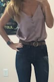 I love this belt because it is completely  adjustable. I need belts like this because I'm not small enough for an extra small size and too small for a small size. It's a thin enough belt that it looks amazing with Levi 721's. The color matches a silk bodysuit that I also purchased from Lulus (the bodysuit is what I am wearing in the photo as well as Levi 721's.) I actually ended up buying the belt to receive free shipping and it turned out to be one of (many) the best thing I bought! - Kara C.