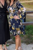 I ordered this dress last minute as a backup for my brother's wedding. As soon as I tried it on though, it was an obvious first choice! It was so comfortable and perfect to wear to an outdoor Fall ceremony. I chose to use a safety pin to create a more modest neckline, but otherwise it fit perfectly. It was slightly see through with its thinner fabric (especially in the sunlight), but I normally wear something underneath my dresses anyway so it wasn't a big deal. - Ashley L.