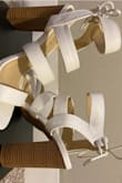 These shoes are so so cute!  They fit well once on- I had a little struggle getting the straps over my foot as I put them on but you can just kind of force them to go through and then the fit is perfect. They are surprisingly comfortable and stable for being 4" tall. - Sierra O.