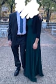 Wore this to play piano at an outdoor fall wedding. It happened to be 35 degrees that day, so I wore leggings underneath and was able to stay nice and warm. The A-line fit made it so you couldn't see any lines from the leggings. I didn't have time to get it hemmed, so I wore 3 inch heels and still could have hemmed an inch or so off. I have a small rib cage, so I probably could have fit into an XS, but S seemed to work just fine. I got many compliments, and it nicely matched the formal style of the wedding. I am hoping to be able to wear it again when it's warm enough to not have to cover the back of the dress. Very happy with my purchase! Would definitely recommend for a formal event! - Sarah H.