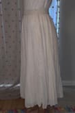 It's so rare to find feminine modest looking skirts like this. It was my first purchase at Lulus, and it left me wanting to shop for more clothes. 
It runs true to size, which is good to know if you're buying online. It's also very comfy and versatile. Wear it for whatever occasion! - Ana O.