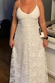 Absolutely love this dress! I knew it was the one as soon as I put it on. It's even prettier in person! I'm tallish, and the length is perfect for a barefoot beach wedding, but may be a little short if you're tall and plan to wear heels. It's a little snug in the waist, but I sized down and it should be perfect once I shed the quarantine 15. I'm smaller in the bust, so the adjustable top works great for me, but may not provide enough support if you're big on top. Can't wait to wear this at my beach elopement! - Samantha C.