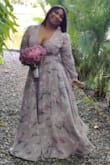 The dress is really pretty. The color is too. My issue is with the size. I requested assistance on regards what size I should buy on the website... In my mind it was XL (because of the sleeves. I am a big arms small waist type) but the person in the chat, after a couple of questions advised me to buy an L size. I did. It was not a good choice. The sleeve did not reach my shoulder. It was very disappointing. I was hoping to use this dress for my pre-wedding photo shoot. Edit 17.10.2020. I refused to give up on the dress because it is beautiful. I found a dress maker and he helped me. He took fabric from the skirt of the dress because it was really long (Am 5ft3) and added it to the sleeves, making the sleeves more loose and fitting perfectly. - Claudia A.
