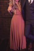 This dress is absolutely amazing! I'm completely obsessed with it! It's definitely something that you can dress up or down based on the occasion! I was initially concerned about the deep v in the front but the way that the fabric overlaps you don't get too chesty! - Kaleigh T.