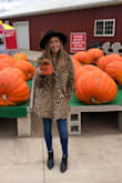 I'm petite, 5'2, and about 114 lbs, so this coat looks longer on me than the model. I have a pretty large bust, but it still fits fine and I could button it. It's thinner than I anticipated, but still very warm. I really like it! - Chelsey P.