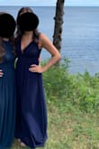 I wore this as a bridesmaid dress and felt so elegant all night! I wore 2 inch heels and had to hem a couple inches off the length, but I'm short so I'm used to that. We also took the shoulders straps up/in a little because I have a short torso, and that made it sit better on my waist. Overall, love this dress, it's so well made and beautiful! Got compliments all night. The details on the top are so lovely too. - Brittany P.