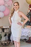 I am obsessed with this dress. I wore it to my bridal shower and had tons of compliments. I did have some length taken off, as I am only 5'2, but that was just preference. I probably could have been okay with a S, but I wanted to feel comfortable. I HIGHLY recommend this dress to any lady needing one for her shower! - Katie D.