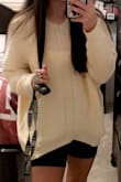 Super cute top, i got it in a medium to wear to more oversized. Love how it looks with biker shorts - Emily C.