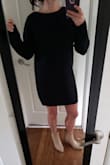 I thought this fit a little large and sizing down would have maybe made it a little more flattering on me. My bust made it drape out, so from the side view it made me look very large/shapeless. It actually looks better straight on in the photo than I thought it looked in person. I returned it and I likely will not end up buying a smaller size. - Melissa H.