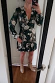 The dress was a nice material, and the dark green with the gold accents were really pretty. It fit well, but it was too low cut for me to wear for work. I was not sure what else I would wear it for, so I returned it despite overall liking the dress. - Melissa H.