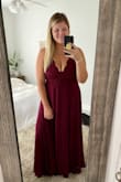 I got this dress for a friends December wedding and it's freaking PERFECT. Number one, the color. You really can't beat this kind of burgundy dark red. It looks good on everyone. Number 2, the no bra situation!! This is a cross back dress with adjustable straps, it makes the girls look amazing and lifted and no bra needed making this the comfiest dress around. I cannnnnnot wait to dance around at the wedding!!!! Definitely need a steamer because the material comes wrinkled but that's no issue whatsoever. I'm also 5'10 and the length was PERFECT to wear with short heels. Pairing it with some chunky gold earrings and feeling like a Queen!!!!!! - Tiffany M.