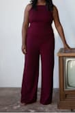 This is the color my bridesmaids will be wearing. I ordered this for our engagement pictures. It has adjustable straps - Long, flattering pants and perfect with a heel. Super nice - Destini H.