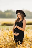 This dress is very thick and a high quality fabric, with great stretch. I usually order a medium from Lulus, however I am 30 weeks pregnant and this was the look I was going for, for our maternity photos and it worked out great. I stuck to medium. I cant wait to wear this after the baby too, its a wonderful dress! - Courtney T.