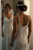So glad I ordered this dress!  It is even more beautiful in person. I will be wearing it on my wedding day!  I had to get it hemmed and my seamstress said it's super easy to hem without ruining the beautiful lace! - Melissa W.