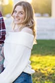 I bought this sweater to wear for engagement photos and I'm really glad I bought a back up sweater! This sweater is super cute and I wanted to love it but it's SO short! It's not short in a way that ordering a size up would fix; it would look baggy if I were to order a size up. Not at all like what's pictured. Very disappointed; unless you're looking for a crop top, I wouldn't recommend.
Edit: I wore the sweater for pictures and tucked it in; not usually my style but it didn't look terrible. After awhile it seemed almost stretched out so it wasn't super short. Still not sure how I feel about it though. Cute enough, but I'm not sure I would buy again. - Kelsey E.