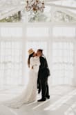 This dress was everything! I previously picked another Lulus dress for my elopement due to this being out of stock, but about a month out from my wedding they had my size. Anyone that saw pictures of my dress thought I paid at least $1,000 for it. Pictures don't do it justice, it's even more gorgeous in person. It fit true to size and it's quite heavy in my opinion. It feels like a dress you would buy at a bridal shop. It's flowy and absolutely gorgeous. My only complaint is the slip underneath. I wish it would have been actually stitched inside to the dress, my photographer and Husband had to constantly fix the slip from showing in pictures. Other than that it's a fabulous dress! - Alexa I.