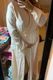 I have been looking for a formal dress for a black-tie optional wedding in November with the caveat that I will be 6 months pregnant. Maternity dresses seem to be a bit pricier and unnecessary since my bump isn't too big yet. I am SO glad I tried this dress and absolutely can't wait to show it off at this wedding! The sleeves and the shoulders are a smidge loose but not so big it overwhelms me. The elastic waist is perfect for sitting at your natural waist or in my case, right over the bump. The top isn't too revealing over my ever-expanding pregnancy breasts but doesn't feel overly covered up. The rest of the skirt flows nicely over everything and the slit keeps it fun. I'm short so I always have to have to have things hemmed, no biggie. I was leaning towards size L pre-pregnancy and am a little surprised this size Large was so roomy. It's very forgiving! - Najeeba G.