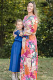 Love, love this dress. I purchased this dress for fall family photos. It photographs beautifully. I have had so many compliments on the dress. The one thing I will say is the neck line is very deep as it's a wrap dress. I had to do a small alteration to tighten that area up....I wore it for family photos after all ;-) - Tricia A.