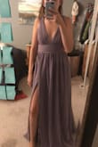 I bought one for my bridesmaids to try on and I will be buying one for myself in the future! It is soooo cute and fits so well. I thought I would be a small and so did some of my friends but we all fit in the medium. I would just go off the waist size primarily! The quality is great, the slit is so cute and it' s a dress that fits a ton of different body types! You can even sew the middle a little bit if you don't like how low cut it is. All around, amazing dress and I'm obsessed!!! - Michelle D.