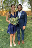I wore this as a bridesmaid dress for my friend's wedding.  It was 90 degrees and I was still comfortable in this dress.  The fabric is stretchy, so having an XS was nice because it was fitted so I didn't need a bra, but I could still breathe perfectly fine.  I'm fairly tall and the length was great on me, not too short.  It's perhaps a little on the brighter blue side than dark navy, as you can compare with my husband's navy blue suit in the picture, but it is was close enough to the other navy bridesmaid dresses.  I really like this dress and I plan to wear it again! - Rebecca H.