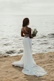 We cancelled our wedding due to COVID and we planned an elopement. This dress was so beautiful and perfect for it, I'm 32G, 115 lbs, and 5'1". Unfortunately, I didn't get the chance to have alterations done, so it was pretty long. However, it was perfect because our photos were on the cliffs/beach! I was a bit skeptical ordering it, but it was worth every penny. It was great quality and beautifully made. You can't go wrong with this dress, especially if you are petite and are a bit fuller in the chest area!  

Thank you, Lulus! I will be ordering more items! - Marshane R.