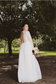 Like many people; I ordered this dress as my wedding dress. I loved it! I did get it altered. I ordered an XL because I was afraid the large would be too small. The XL was a little too long and the sleeves were losse but once altered it was perfect!! It arrived in less than a week! - Elizabeth G.