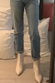 Exactly what I wanted in a white boot. It's super chic and looks great with any outfit, jeans or a dress. Only issue is the front is a little tight, but I've been wearing it around the house to break them in and they've slowly become more and more comfortable. Also, the material is stiff so if you have skinny ankles like me, it may bruise the front of your ankle as you work to break it in. If you want to skip the break in process, I suggest going a half size larger. - Rebecca S.