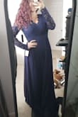 If I wanted to wear this anywhere I would definitely need it hemmed, but the lace material was so uncomfortable (especially the sleeves) so I couldn't keep it on longer than 10 minutes. The fit itself was great in terms of the waist and bust but overall it was so much fabric and didn't feel good on. I ordered it for a wedding but decided to return! - April L.