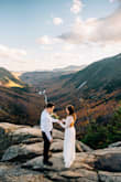 Had to hem because it was too long and get it taken in around the armpit area but was beautiful! Almost felt like the sleeves were too loose also, and I ordered the Xxs! Had a mountain elopement and it was perfect. - Jordan P.