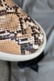 I love the way these look and are a perfect addition to any outfit, but i've worn them four times and there is already a small little rip. They are slightly smaller than normal size nine but not to the point you need to go up a size. - Lauren B.